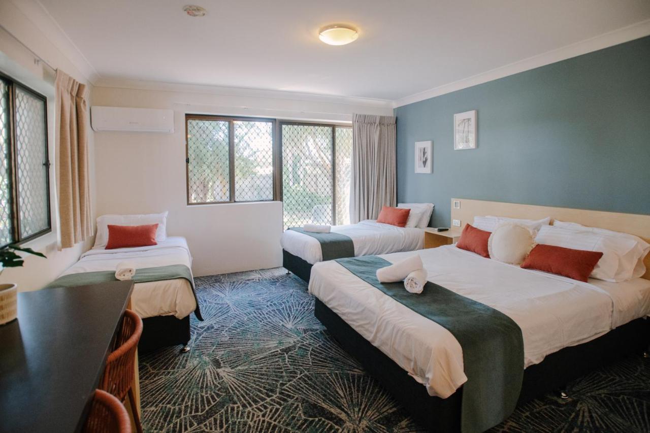 Family Room with Queen and Two Single Beds