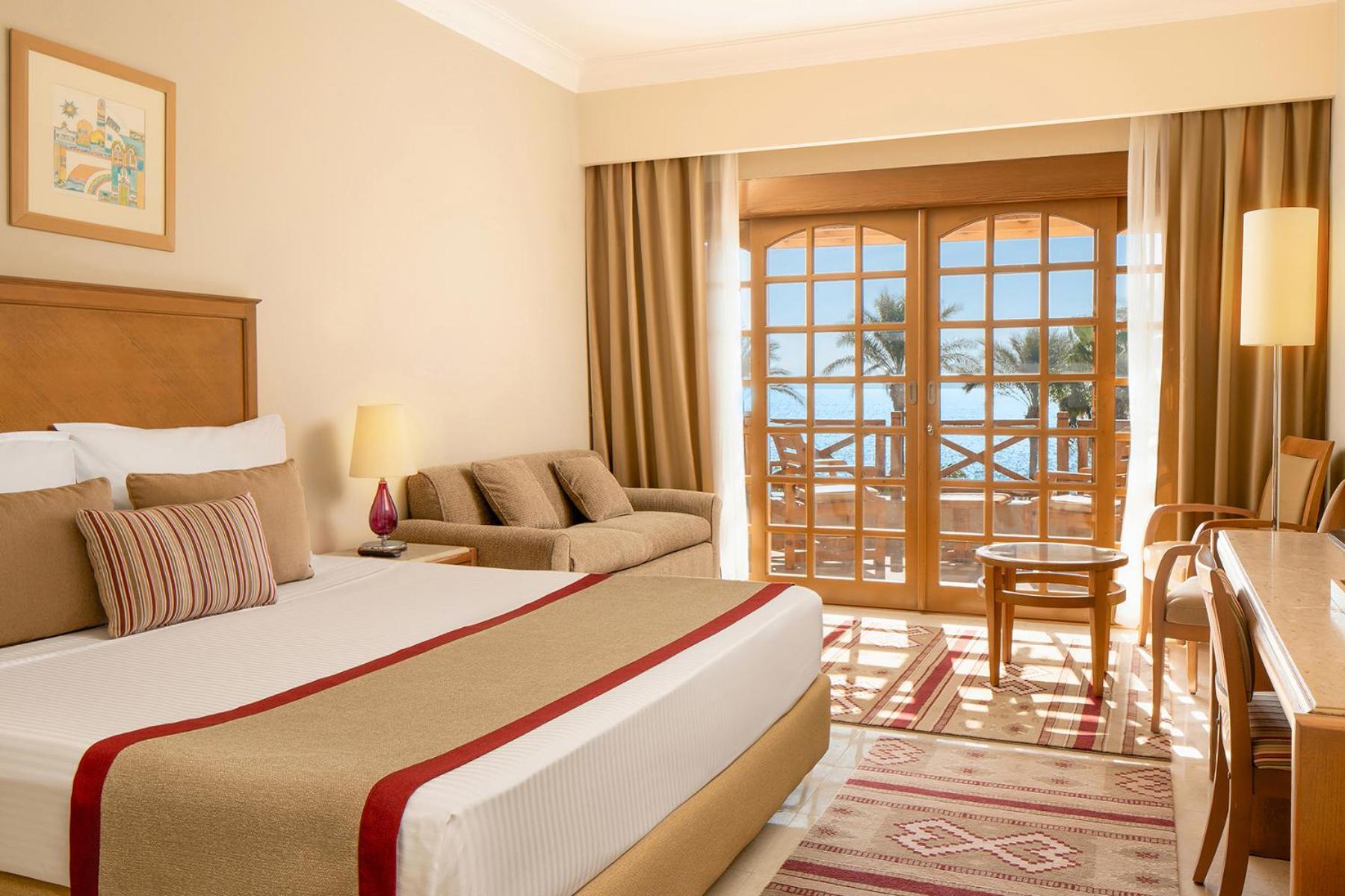 Deluxe Nelson Kamer met Queensize Bed en Uitzicht op de Zee