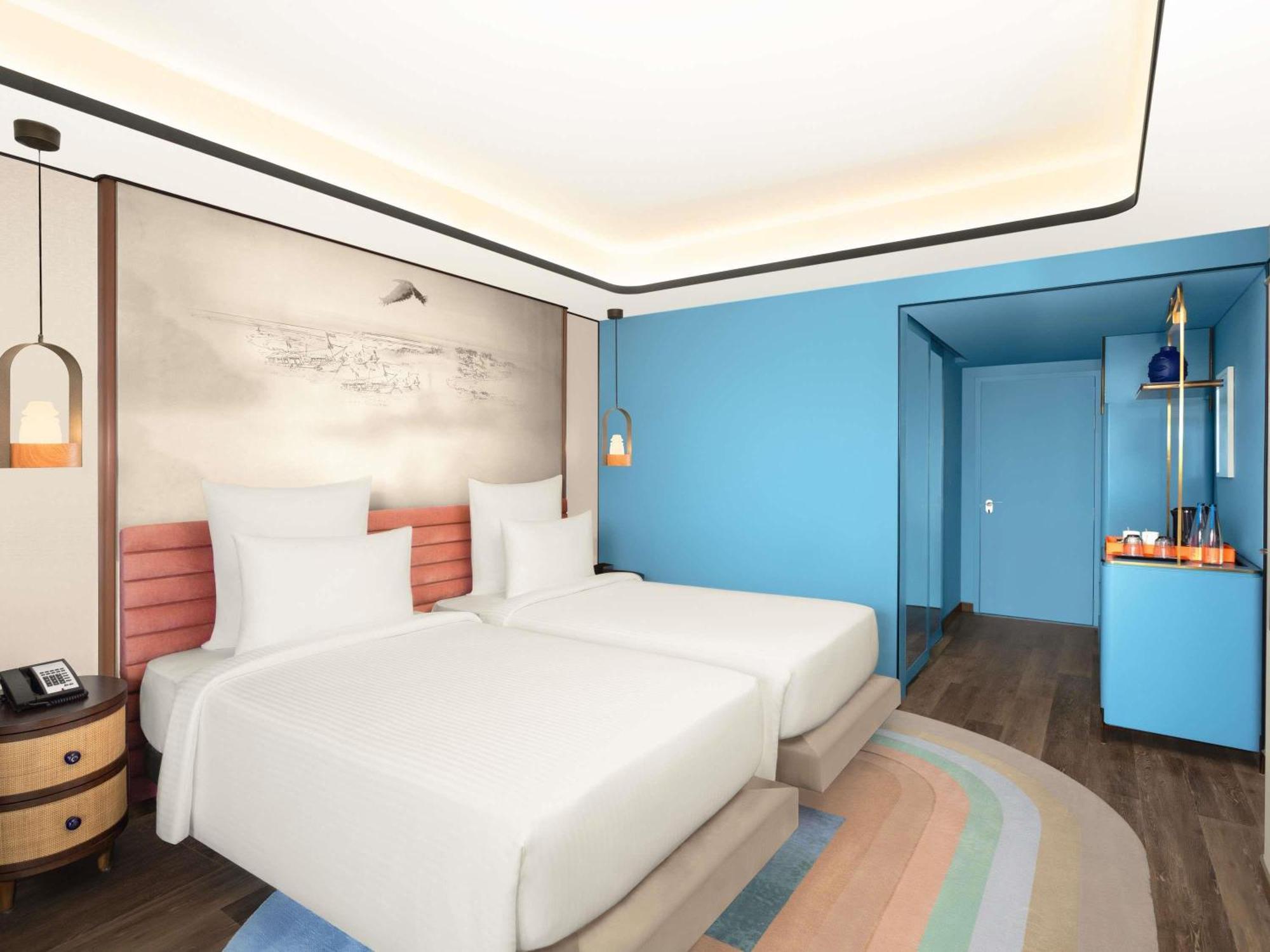 Superior Twin Room with Balcony - 2 pints of Beer & 20% off on SPA and Salon - Happy Hour Special: 50% discount on select brands (4-8 PM ) - 15% Discount on Transportation