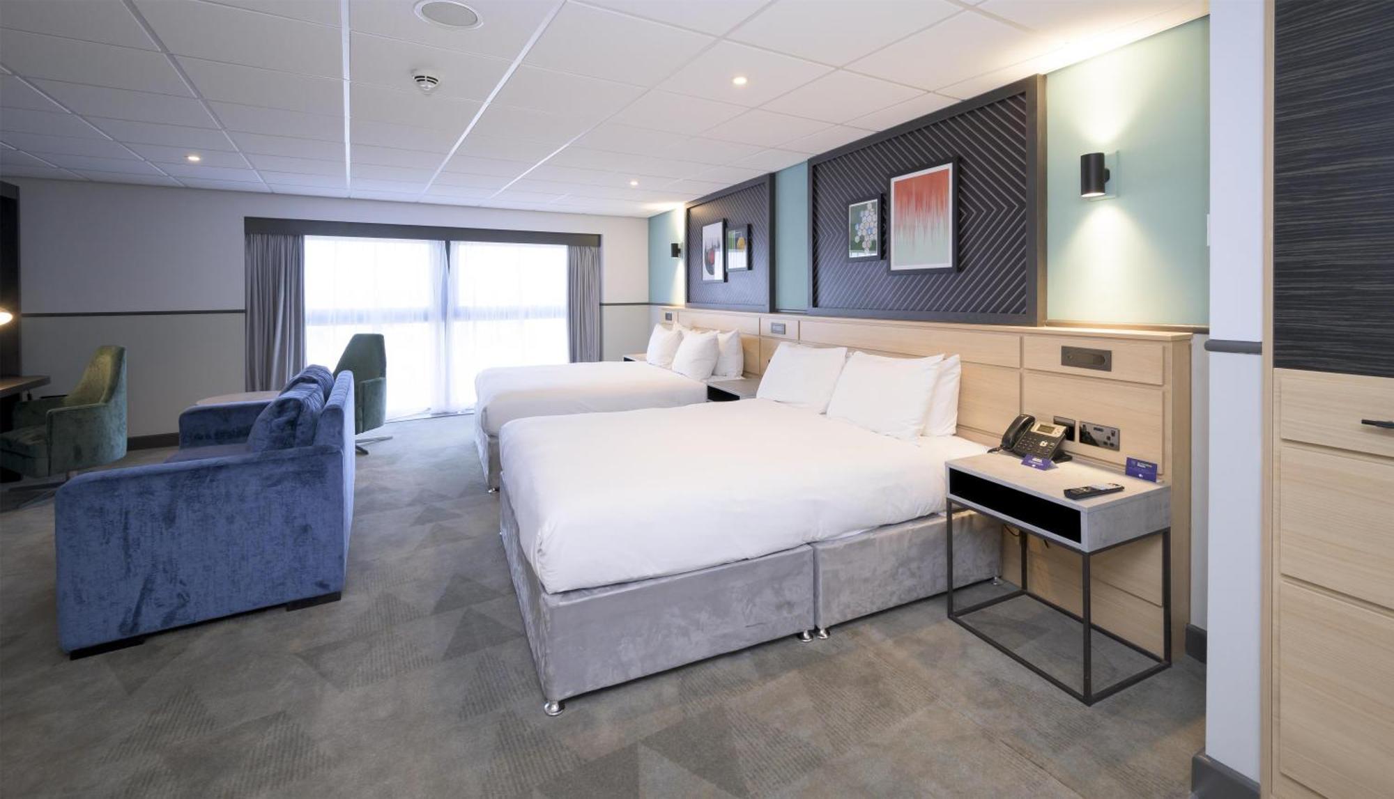 Family Queen Room with Two Queen Beds and Sofa Bed