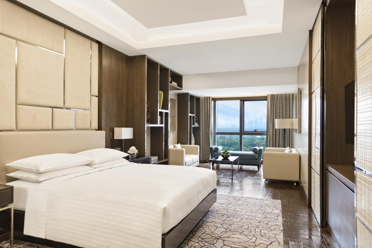 Chairman Suite mit Kingsize-Bett und Zugang zur Lounge
